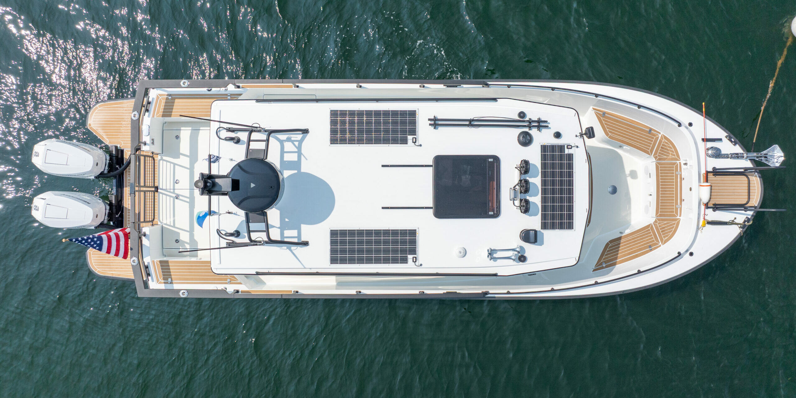 Top-down aerial view of a Targa 32 Outboard floating in Casco Bay, Maine.
