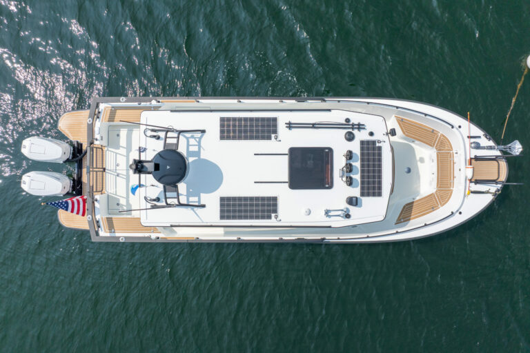 Top-down aerial view of a Targa 32 Outboard floating in Casco Bay, Maine.