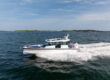 Axopar 29 XC Cross Cabin cruising in Casco Bay, Maine, photographed by East Coast Yacht Sales.