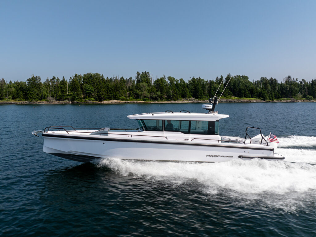 Axopar 37 XC Cross Cabin with BRABUS Trim cruising in Casco Bay, Maine, photographed by East Coast Yacht Sales.