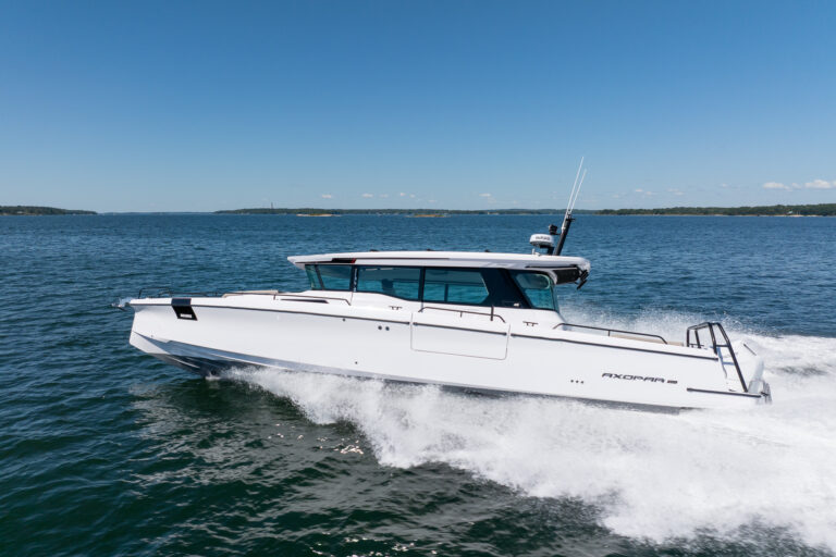 Axopar 45 BRABUS Edition Cruising through Casco Bay, Maine on a sunny day