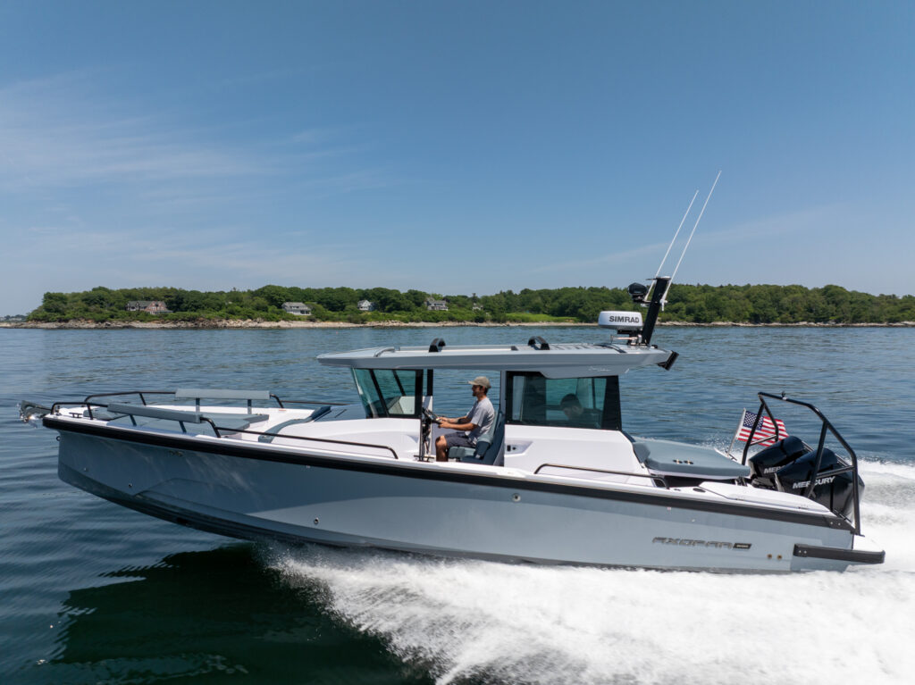 Axopar 29 XC Cross Cabin BRABUS Edition with platinum grey hull running on open water in Maine.