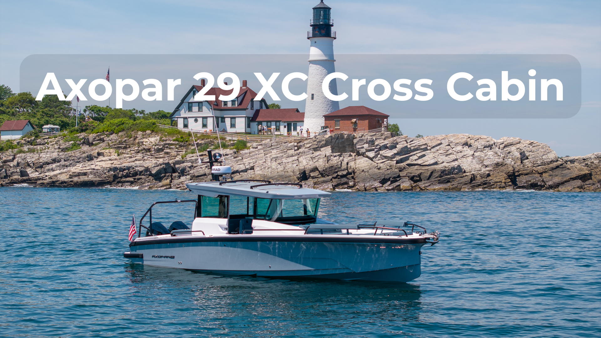 AX 29 XC Cross Cabin Discovery Lead Axopar 29 Cross Cabin BRABUS edition in front of the Portland Headlight with text floating above the boat
