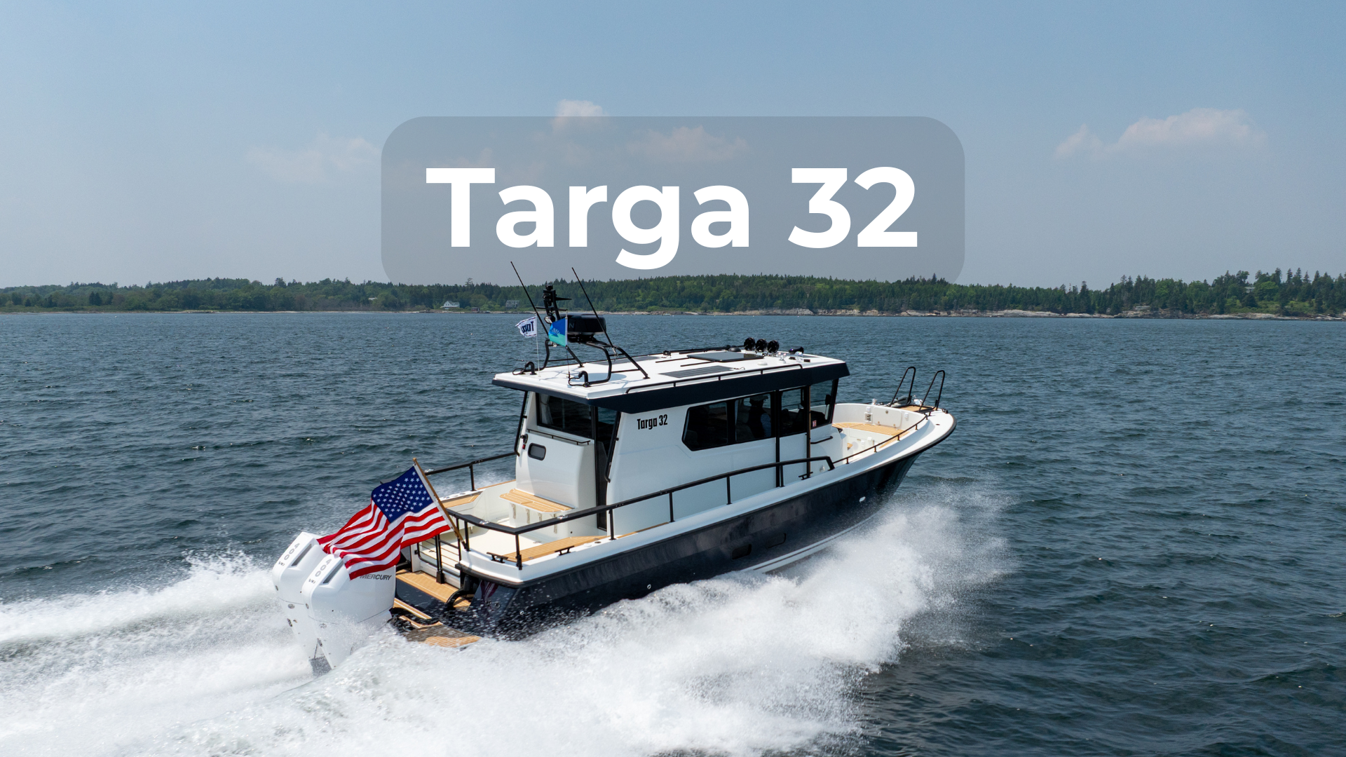 Targa 32 cruising at speed with twin outboards, enclosed pilothouse, and secure walkaround decks