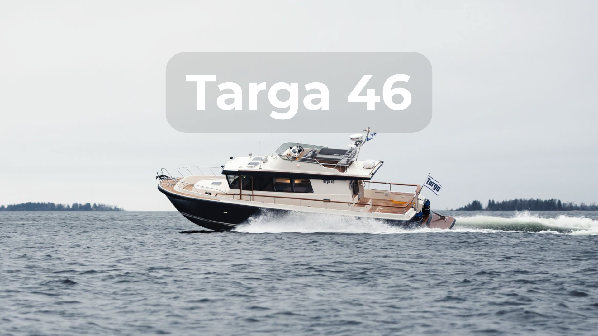Targa 46 cruising at speed in open water, showcasing its enclosed pilothouse design, teak decks, and offshore capability
