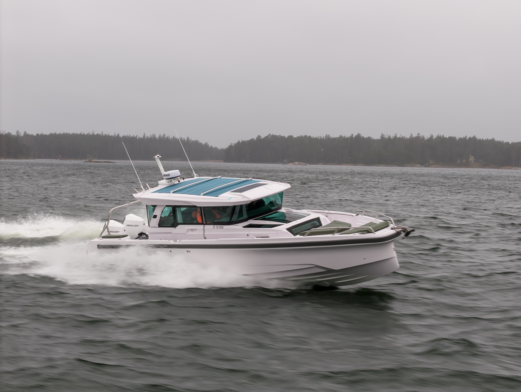 Axopar 38 running at speed in the Finnish archipelago during Axopar 38 media day near Helsinki.