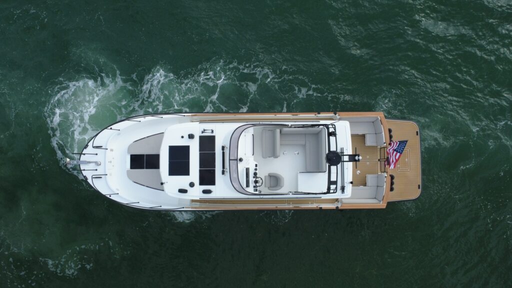 Overhead aerial view of a Targa 41 cruising in Florida, showing the flybridge, walkaround decks, and aft cockpit layout.