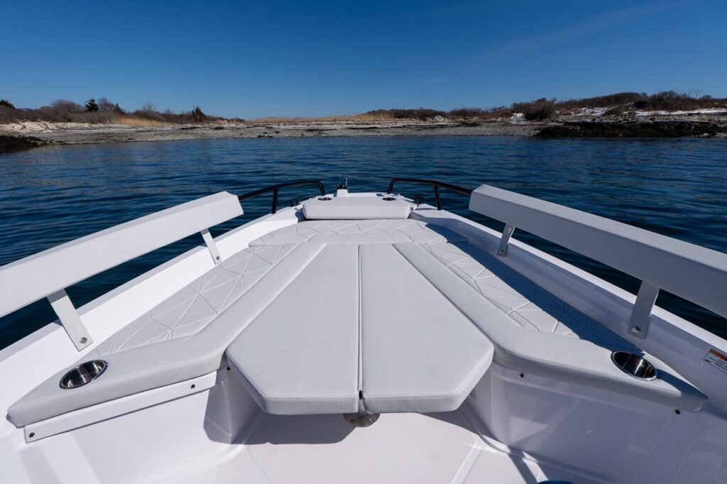 Axopar 29 bow sunbed with Chalk upholstery and side backrests