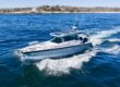 Axopar 29 Cabin underway with Chalk upholstery and Platinum Gray hull viewed from above